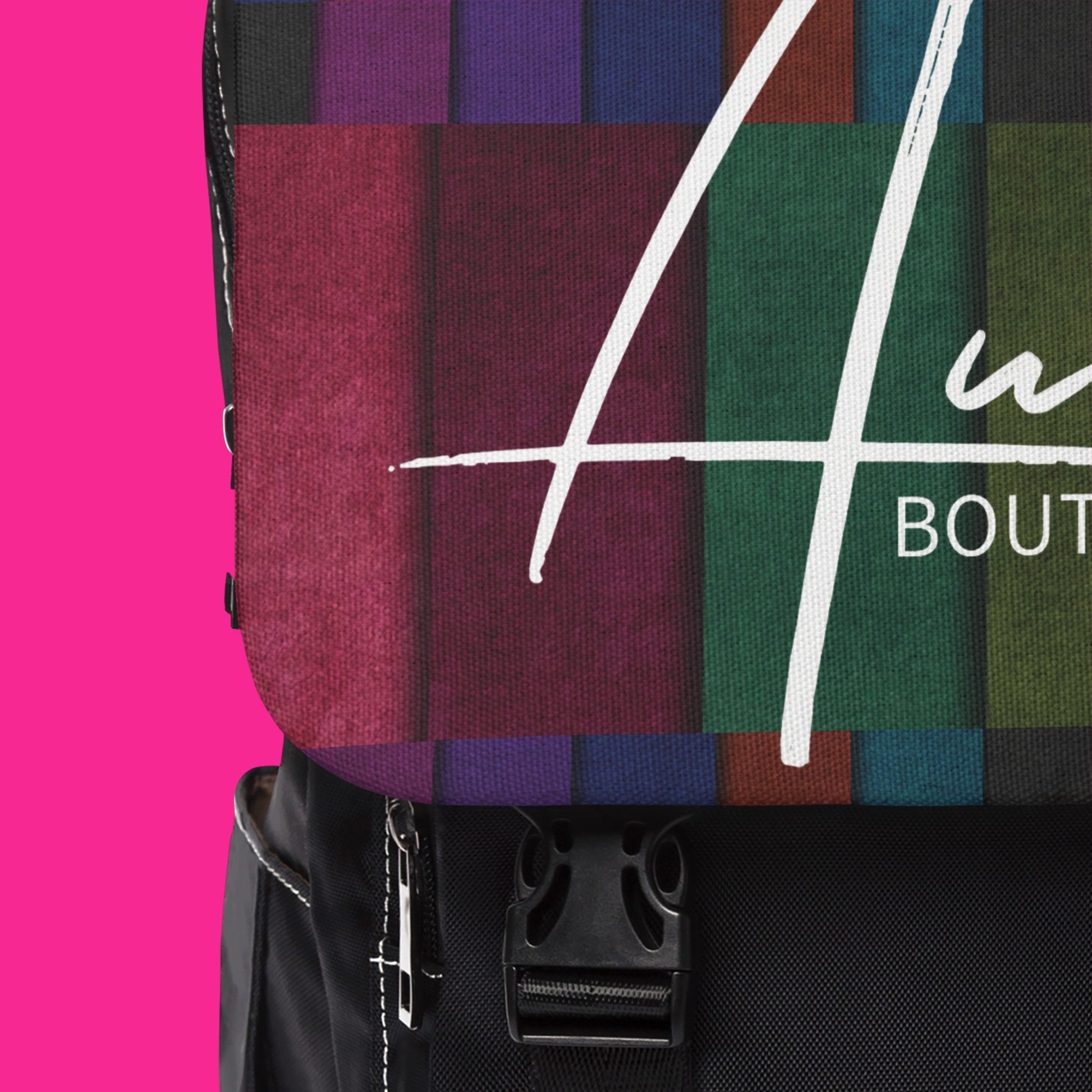 A touch of fun! Auras Boutique's Casual black backpack features a statement multicolored flap (including shades of (purple, blue, green, and burgundy) with buckles. Shop trendy & functional bags.