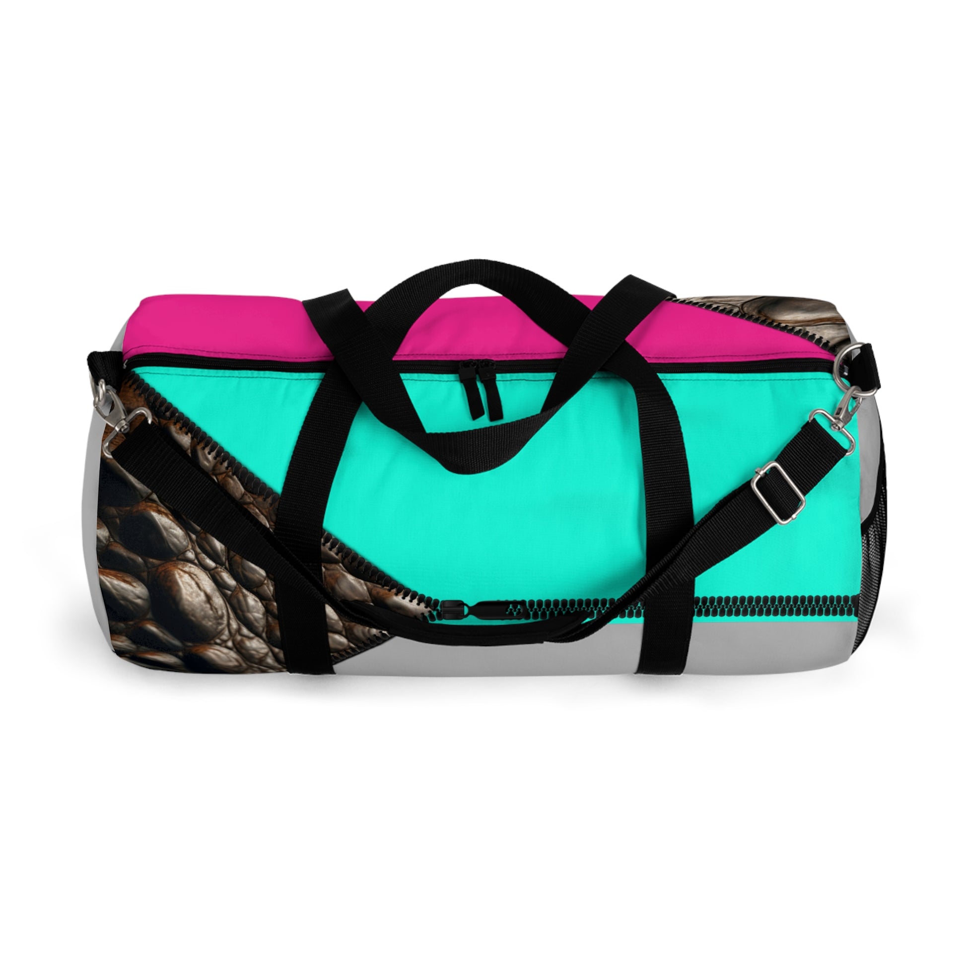 LUXE- Duffel: Top view of light grey bag with crocodile texture print over Auras Turquoise and Auras Rose.