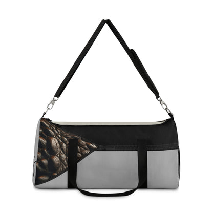 LUXE- Duffel: Front view of light grey bag with crocodile texture print over beige and black.