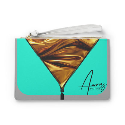 Luxe-Clutch: Front view of light grey clutch with gold texture print over Auras Turquoise. 