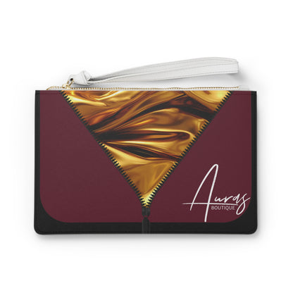 Luxe-Clutch: Front view of black clutch with gold texture print over merlot. 