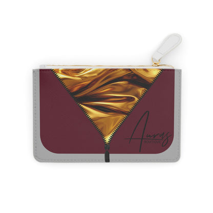 Luxe-Porte Monnaie: Front view of light grey mini clutch with gold texture print over merlot.