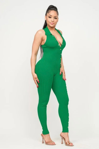 Jaded Bodysuit: Left side view of sleeveless green bodysuit with collar & gold buttons from chest to ankle on model.