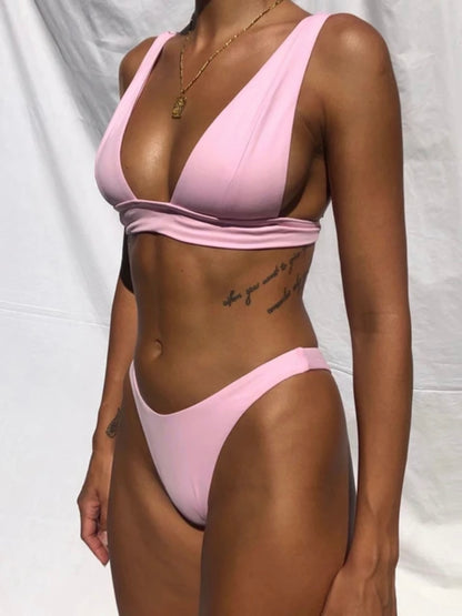 Sunkiss: Side view of pink 2 piece swimsuit on model.