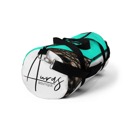 Luxe- Gym Bag: Stylish  and functional duffel for workout. Front view white bag with crocodile texture print over Auras Turquoise and Auras Turquoise.