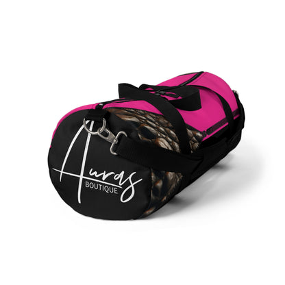 Luxe- Gym Bag: Stylish  and functional duffel for workout. Front view black bag with crocodile texture print over Auras Rose and Auras Rose.