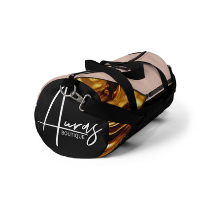 Luxe- Gym Bag: Stylish  and functional duffel for workout. Front view black bag with gold texture print over coral and coral.