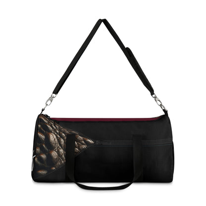 LUXE-Duffel: Left side view of black bag with crocodile texture print over merlot and black.